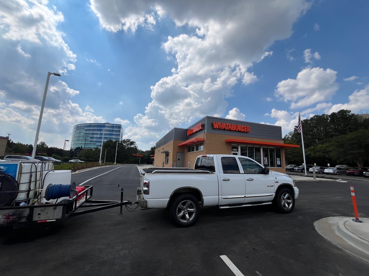 Quick-service restaurant exterior during post-construction cleaning